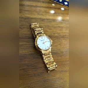 Bulova ladies watch, rose gold PVD with mother of pearl face